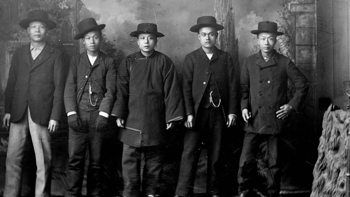 Chinese men standing together, B&W Photo