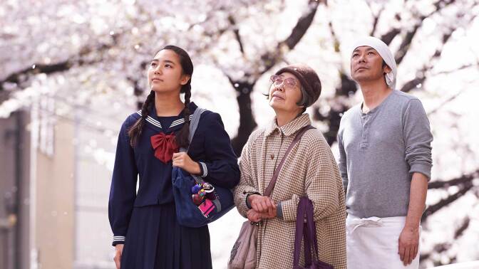 Wakana, Tokue and Sentarô looking upward as they admire something. | Still from "Sweet Bean"