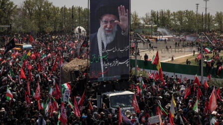 News Wrap: Funeral held for Iran's late Supreme Leader