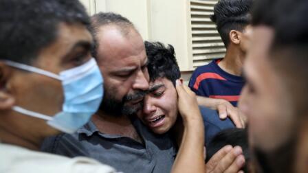 News Wrap: Roadside bombings kill at least 13 in Afghanistan