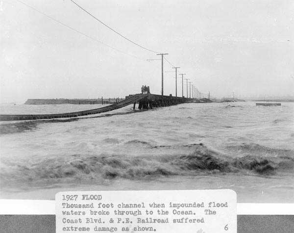 The mouth of a swollen Santa Ana River near Newport Beach and Huntington Beach, 1927. Courtesy of the Orange County Archives.