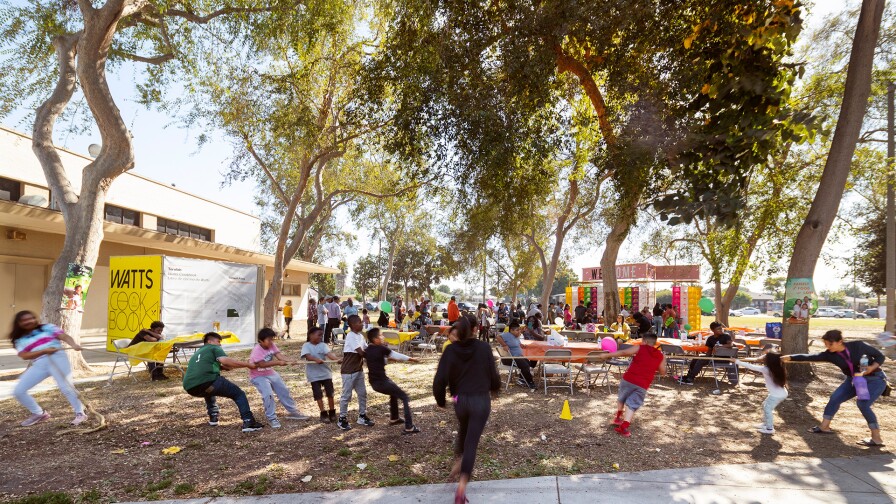 Participants play a tug of war during the Watts Cookbook © event initiated by ToroLab 2019 | Panic Studio LA, Courtesy of City of Los Angeles, Department of Cultural Affairs, CURRENT:LA Food© ab s11 episode image