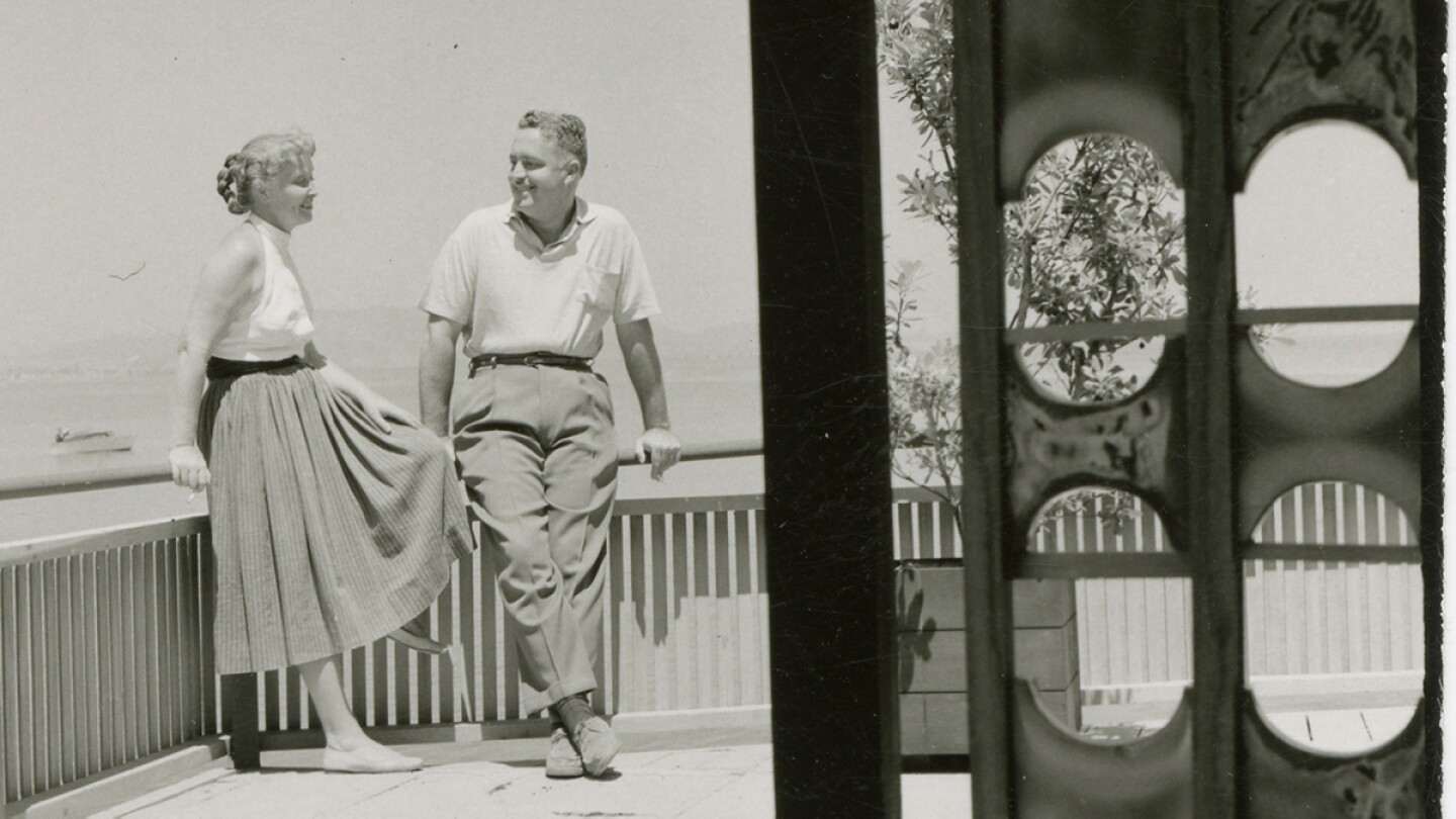 Brian and Edith Heath on the patio of Dorothea, a barge they converted into a home | Courtesy of the Environmental Design Archives at UC Berkeley