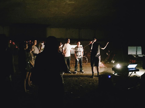 A freeway overpass at the edge of the L.A. River is both an unlikely and perfect place to have an exhibition and screening. Photo courtesy of EYCEJ.