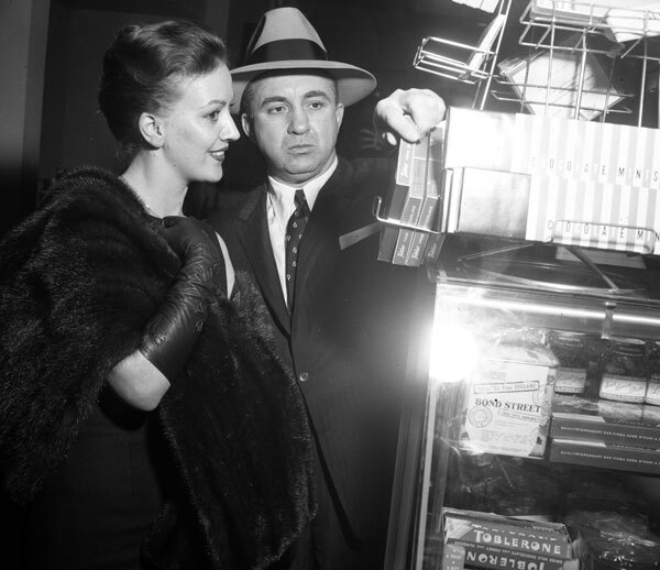 Cohen with Barbara Darnell, whom the Los Angeles Examiner identified as Cohen's 'secretary and sometimes girl friend,' in 1958. Courtesy of the Los Angeles Examiner Collection, USC Libraries.