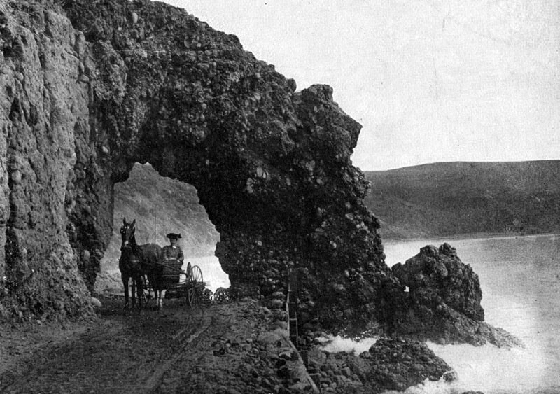 A primitive wagon road, shown here at Arch Rock, connected Santa Monica to the Rindge ranch before construction of the Roosevelt Highway. Courtesy of the Photo Collection, Los Angeles Public Library.