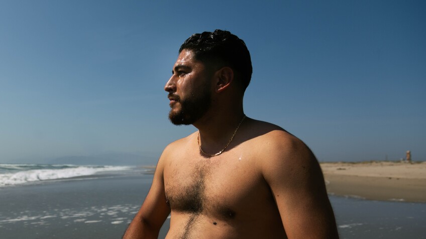 Albert Hernandez, a longtime resident of Oxnard, is in the waters on Oxnard Shores.
