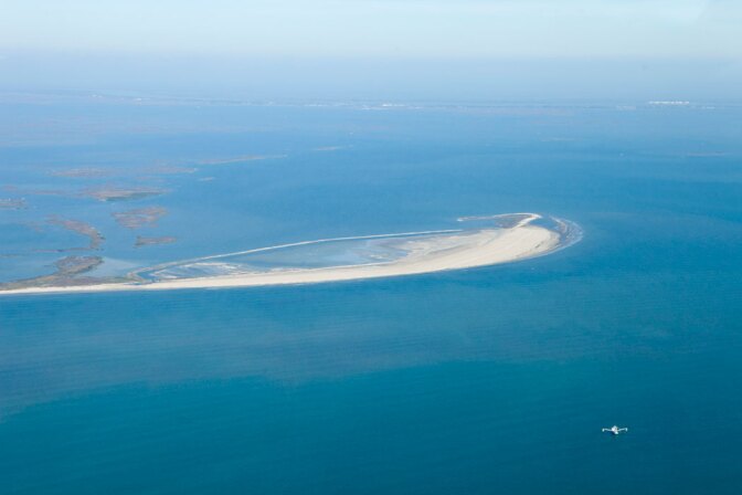 Barrier islands such as this one off the Louisiana coast are one of the first lines of defense against dangerous storms. | Nicky Milne/Thomson Reuters Foundation