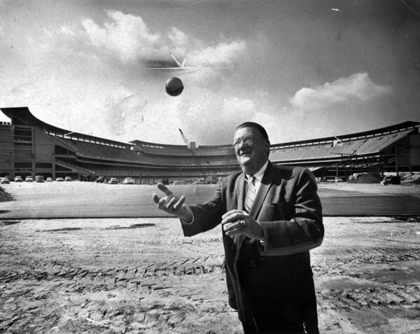 Dodgers president Walter O'Malley in front of a nearly completed Dodger Stadium in 1962. Courtesy of the Photo Collection - Los Angeles Public Library.