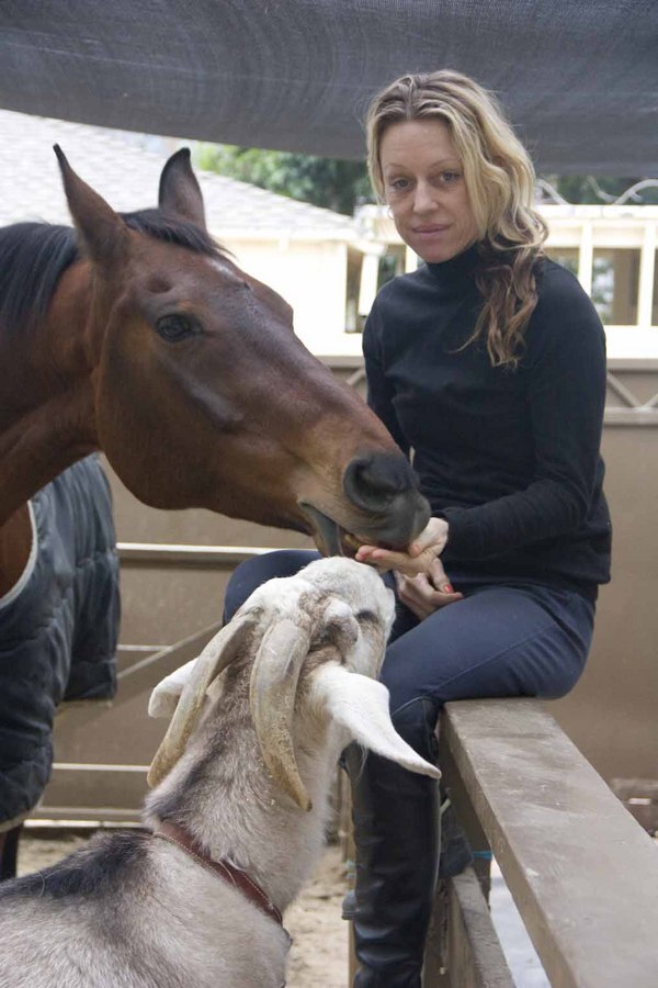 A mini managerie in one's backyard. Dyer, her horse, Simone, and goat Milo.