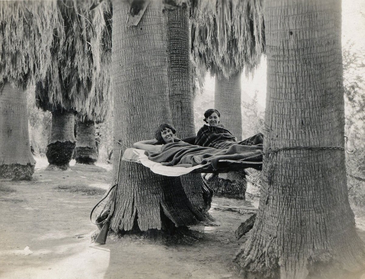 Susie Keef Smith and Lula Mae Graves lounge in hammocks at Corn Springs, 1930. | Warner Graves Collection.