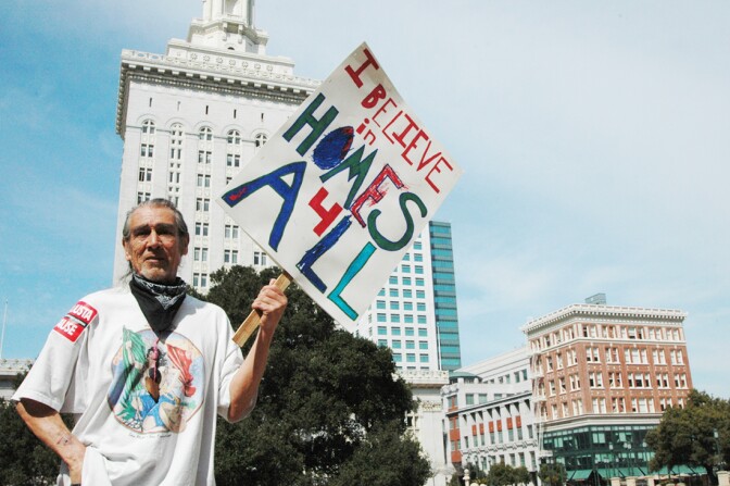 A Causa Justa :: Just Cause activist demonstrating in the Oakland Homes for All Campaign in 2013. | Right to the City Alliance/Flickr/Creative Commons