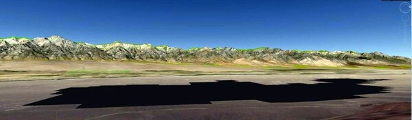A computer rendering of LADWP's 1,200-acre Southern Owens Valley Solar Ranch as it would appear if built. Manzanar National Historic Site appears as the light green area towards the middle left of the image.