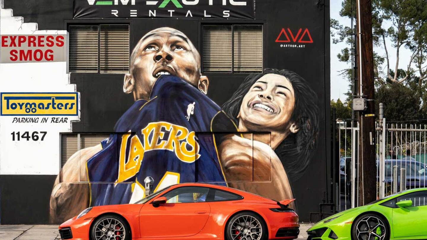 A mural honoring Kobe Bryant and his 13-year-old daughter, Gianna, who died in a helicopter crash along with seven others. The mural was painted by artist Artoon | Ronen Tivony / Echoes Wire/Barcroft Media via Getty Images