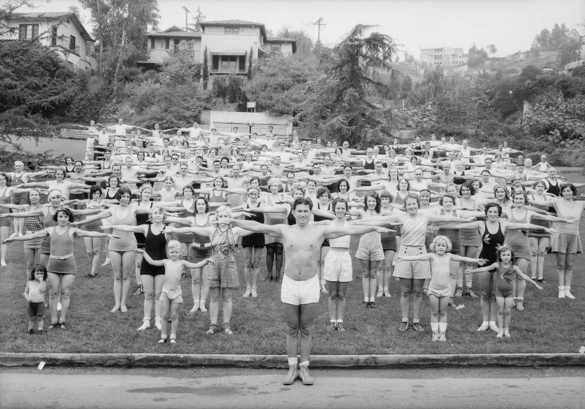 Bragg leads his Wanderlusters in a post-hike workout in Griffith Park, 1932. Courtesy of the USC Libraries - Dick Whittington Photography Collection.