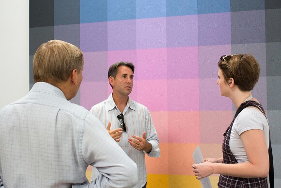 Brian Goeltzenleuchter speaking with patrons at his 2014 exhibition, "Sillage," Santa Monica Museum of Art.