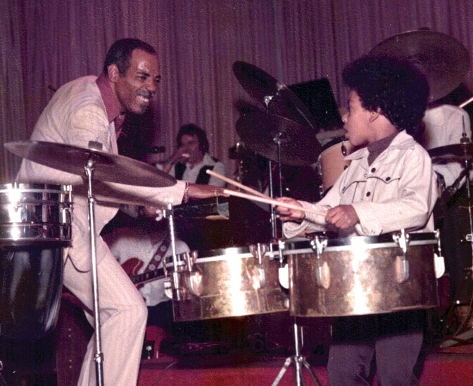 Photo of percussionist Willie Bobo with son Eric Bobo