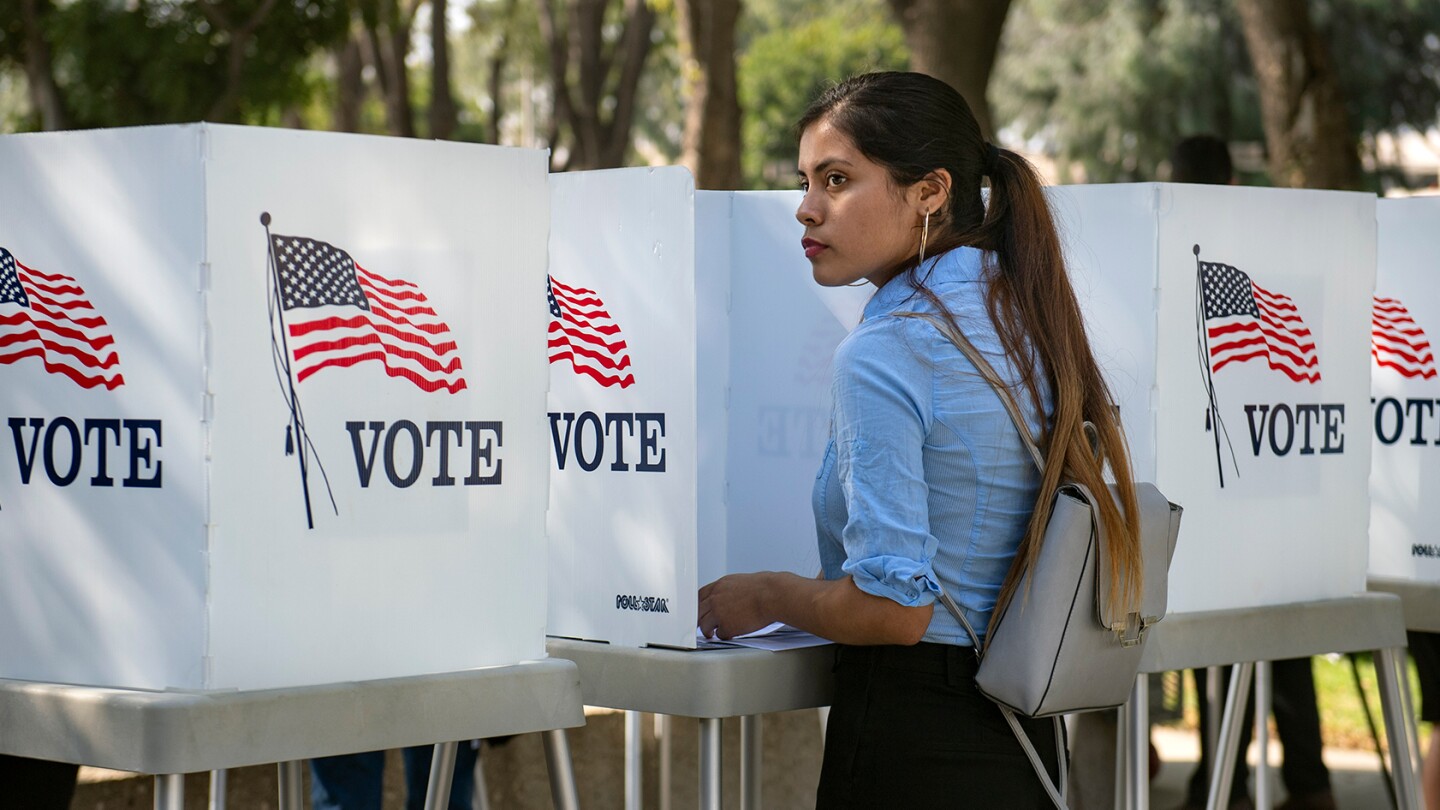 Destiny Martinez, 18, votes for the first time at the Power California early voting event and festival for students of the Los Angeles Unified School District on Wednesday, October 24, 2018 in Norwalk. | Mindy Schauer/Digital First Media/OC Register