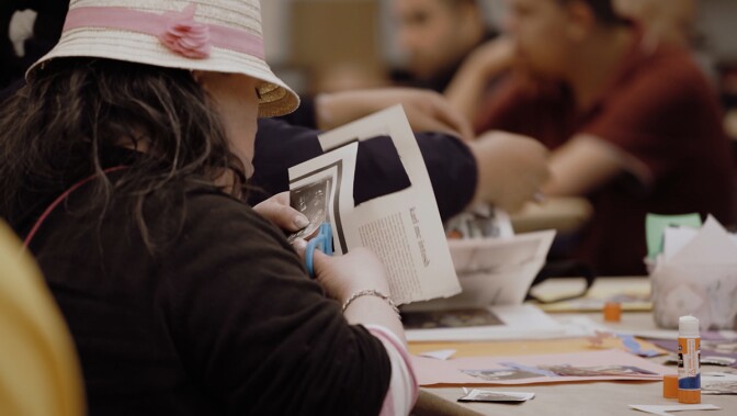 A student making art at Watts Towers Arts Center | Still from "Watts Towers Arts Center" ab s11