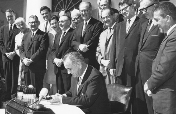 President Lyndon Johnson signing the the Land and Water Conservation Fund Act in 1964 | Photo: National Park Service