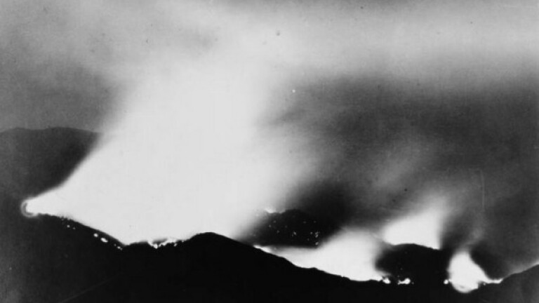The San Gabriel Mountains on fire in 1924. Courtesy of the Title Insurance and Trust, and C.C. Pierce Photography Collection, USC Libraries.