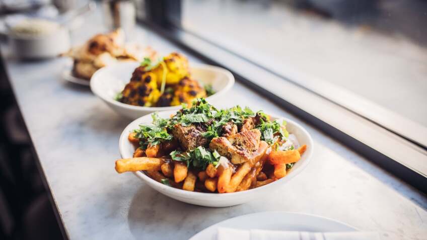 Chicken Tikka Poutine | Courtesy of Life & Thyme