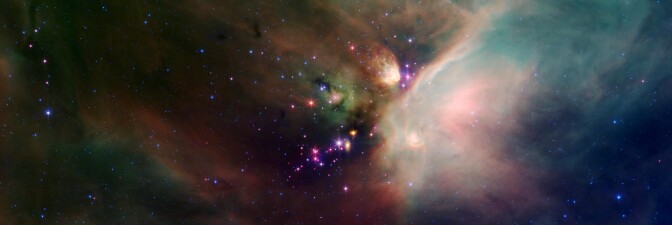 Newborn stars peek out from beneath their natal blanket of dust in this dynamic image of the Rho Ophiuchi dark cloud from NASA's Spitzer Space Telescope. | Flickr/NASA Marshall Space Flight Center/Creative Commons (CC BY-NC 2.0)
