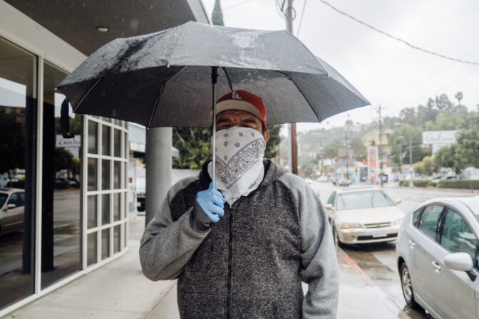 Luis Guzman, who lost his job as California went into shutdown, relies on the bus to get around. As a worker in the U.S. illegally who will not be receiving money from the federal stimulus package, he tries to limit all interaction.
