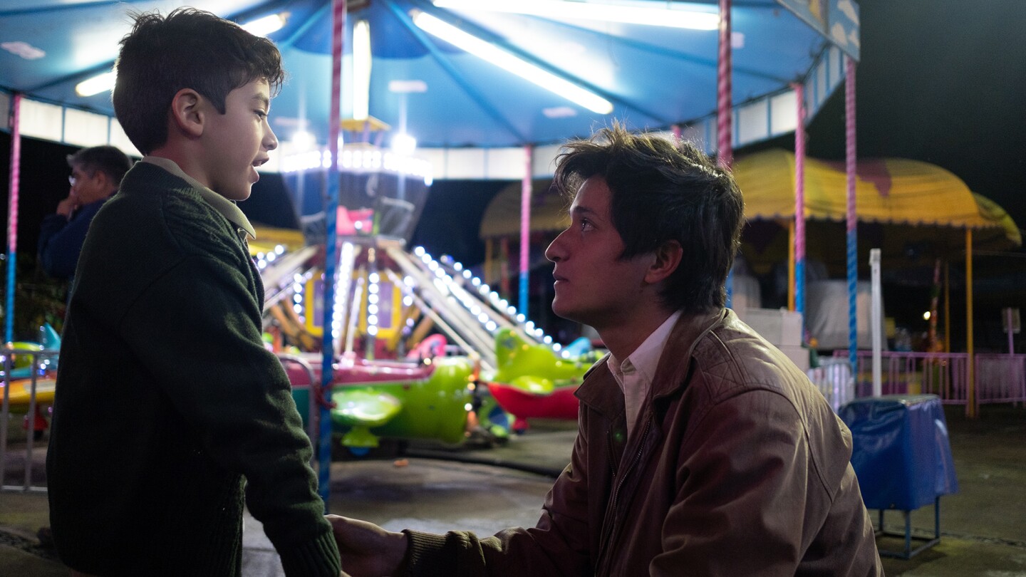 Jose Ángel Garrido as Young Ricky, Armando Espitia as Iván in "I Carry You With Me."