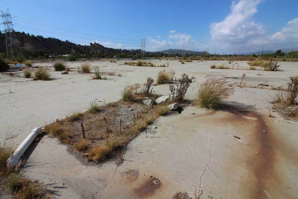 corrosion outline on cracked cement floor at Taylor Yard. | Courtney Cecale