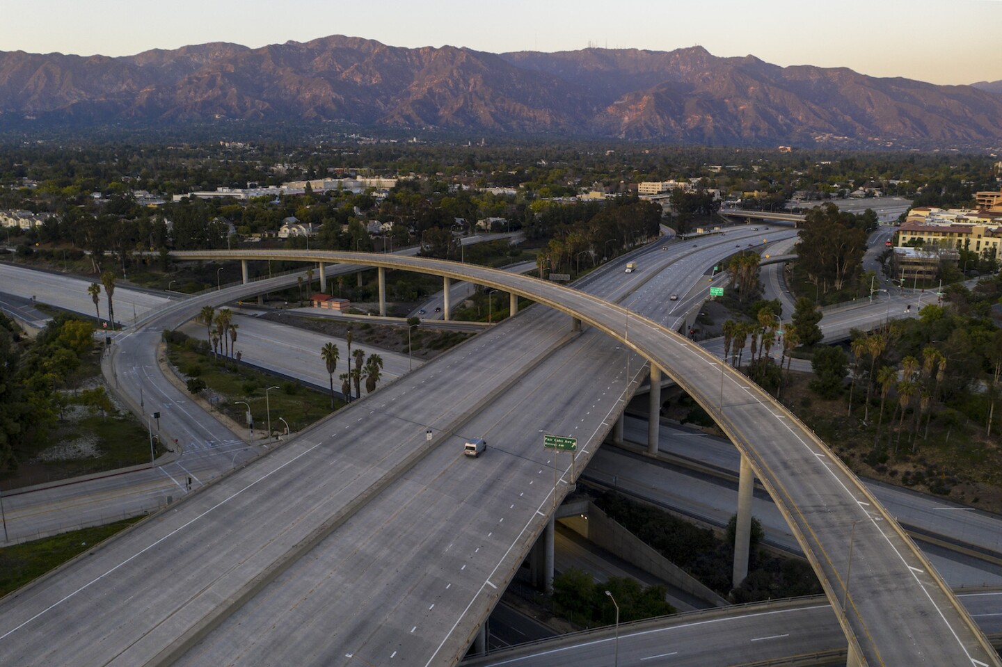 Empty freeways during covid-19 pandemic, with L.A. mountains in the back
