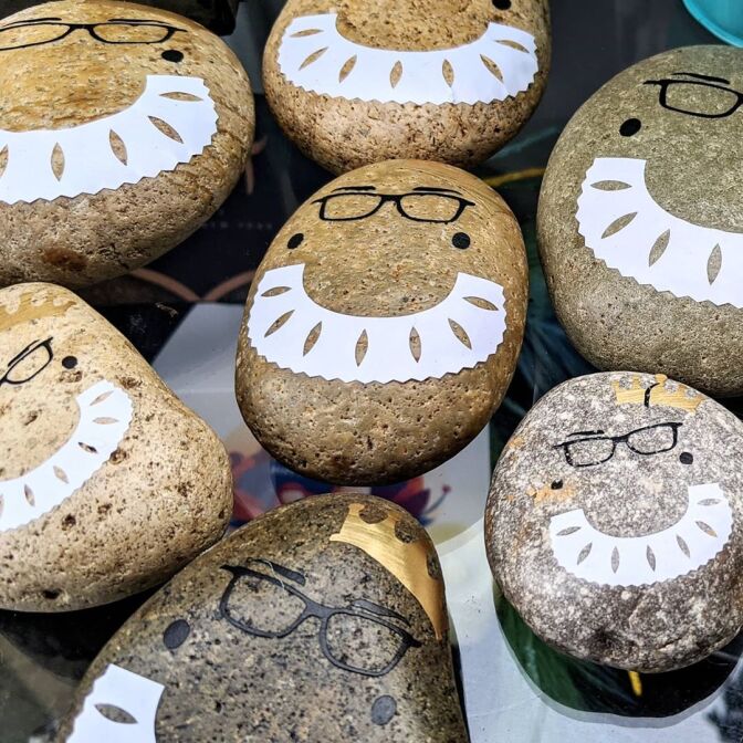 After Ruth Bader Ginsberg’s death, rocks decorated with her signature black-framed glasses and lace collar made their way into the Tiny Museum | Courtesy of Tiny Museum