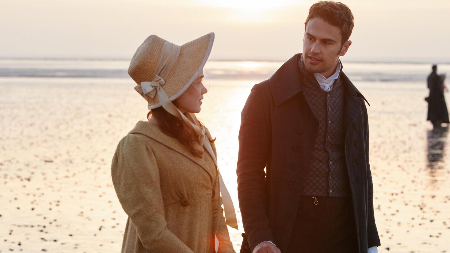 A man faces a woman at his side on a beach. | "Sanditon on Masterpiece: Episode 3"