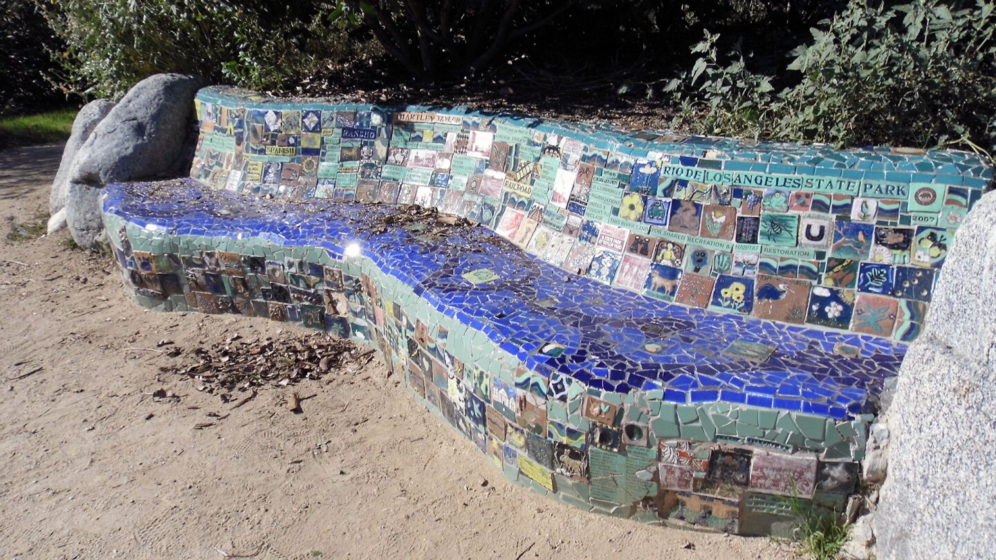 A community-created bench at Rio de Los Angeles State Park tells the diverse history of the parkland in mosaic tile. | Sandi Hemmerlein