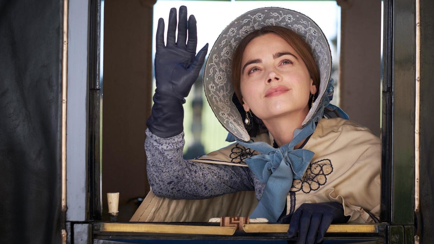 Queen Victoria (Jenna Coleman) waves from a carriage window. | "Victoria Season 3 on Masterpiece: A Show of Unity"