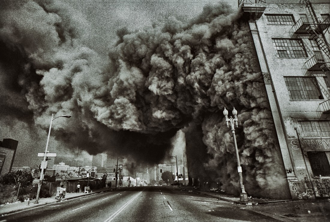 A large building housing a swap meet mall on fire at 7th Street and Union Ave in Pico/Union. LA Riots | Ted Soqui