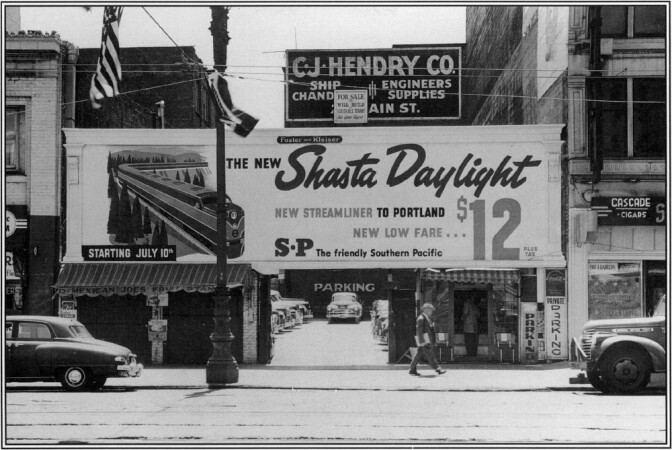 A billboard along San Francisco's Main Street in 1949 advertised the Southern Pacific's new streamliner service to Portland, for a fare that certainly evokes an earlier era. Courtesy California State Railroad Museum, Sacramento.