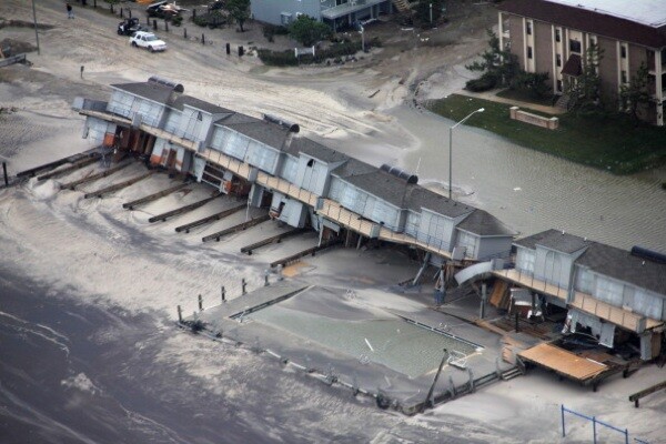 Property damage along the New Jersey coast caused by Hurricane Sandy. | Photo by Petty Officer 2nd Class Erik Swanson/U.S. Coast Guard via Getty Images)