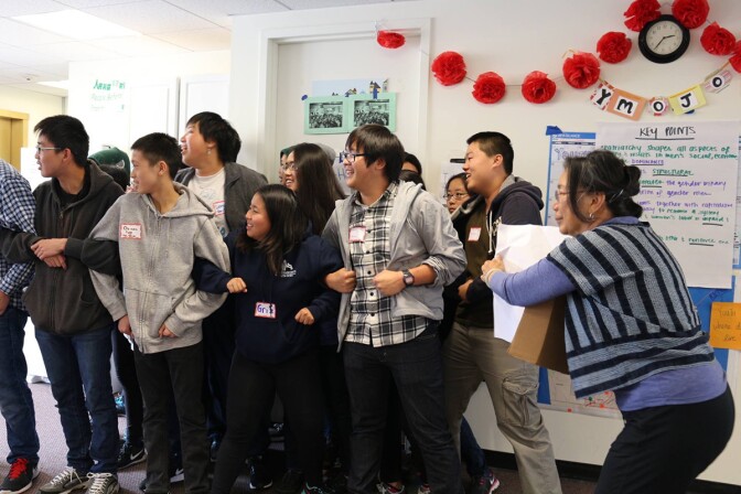 Pam Tau Lee with YouthMOJO members at Chinese Progressive Association, circa 2014 | Chinese Progressive Association