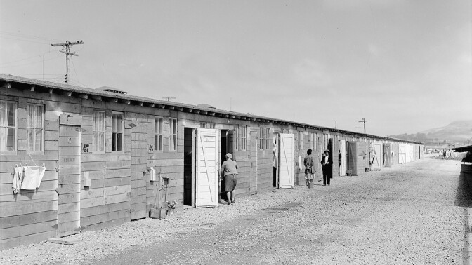 One type of barracks for family use. These were formerly stalls for race horses. | Dorothea Lange, War Relocation Authority Photographs of Japanese-American Evacuation and Resettlement / National Archives ABs10 MMD