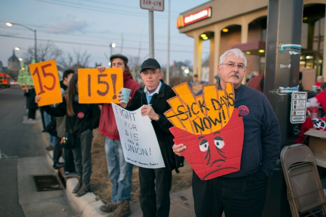 Fast food workers on strike for higher minimum wage and better benefits