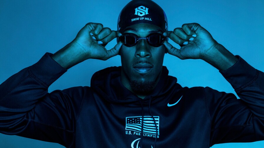 Jamal Hill, Paralympic swimmer, photographed with a blue tint