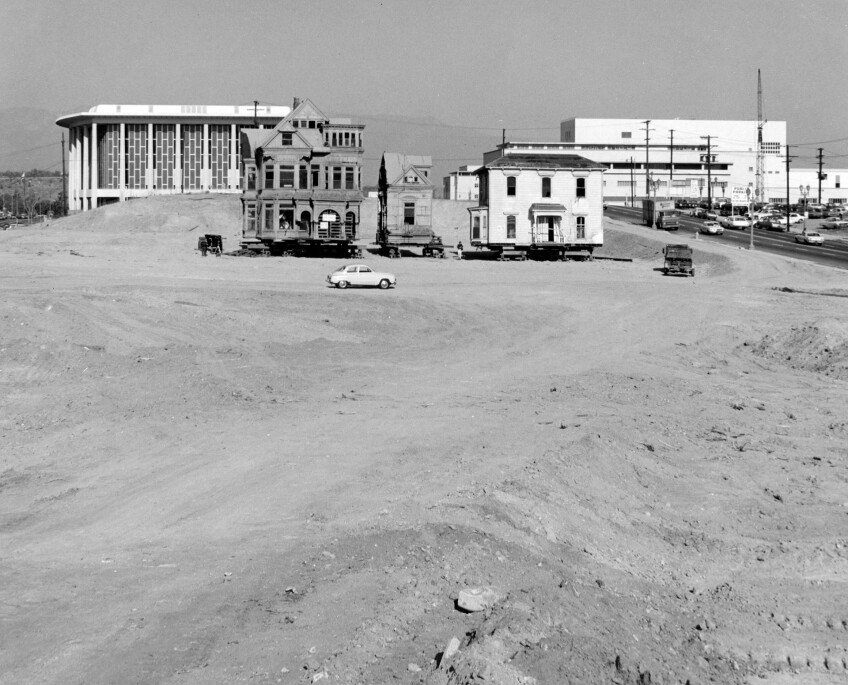 Two remnants of Bunker Hill, their surroundings completly transformed by regrading, prepare for relocation. Courtesy of the Security Pacific National Bank Collection - Los Angeles Public Library.