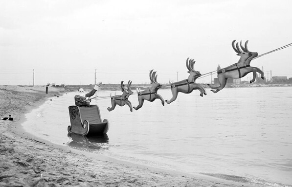 Santa Claus participates in a stunt at a speed boat rodeo at L.A.'s Cabrillo Beach on Christmas Eve, 1955. Courtesy of the Los Angeles Examiner Collection, USC Libraries.