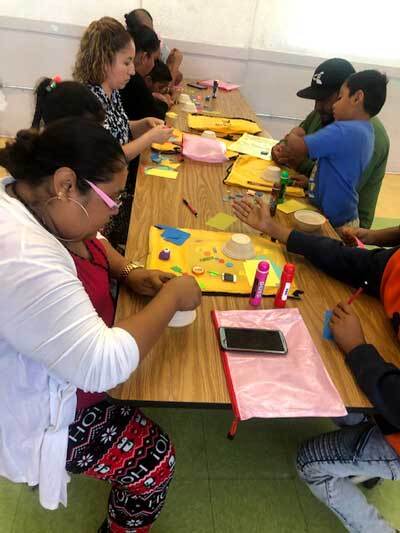 A group of parents and children at McKinley Elementary School