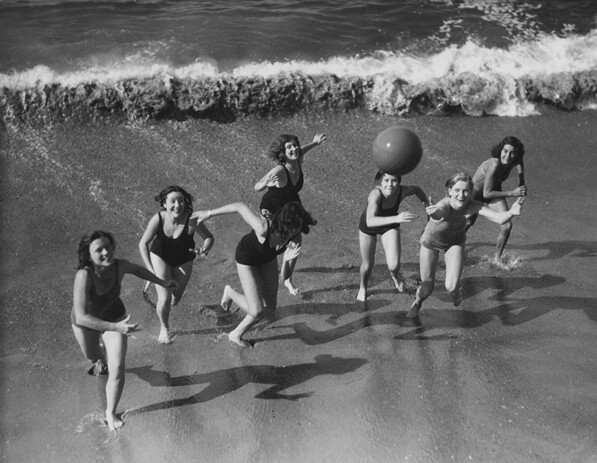 Women chase a ball on a Los Angeles-area beach, circa 1930. From the Los Angeles Area Chamber of Commerce Collection.
