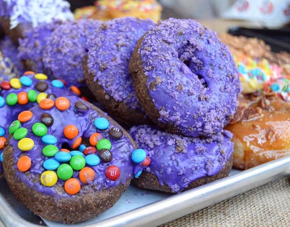 The original ube donut and other flavors | Courtesy of DK's Donuts