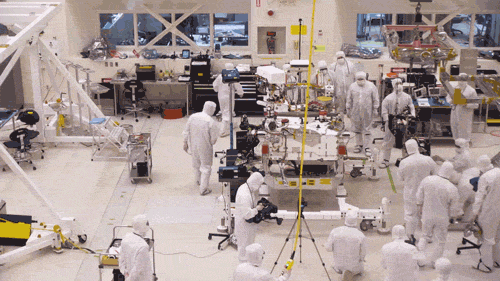 JPL engineers install the legs and wheels on the Mars 2020 rover on June 13, 2019. | NASA/JPL-Caltech
