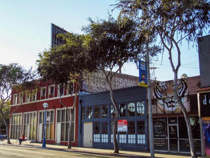 A ghost sign reads “Melba Drugs” and “BROMO SELTZER” on the east-facing side of the Fruechtl building in West Hollywood.
