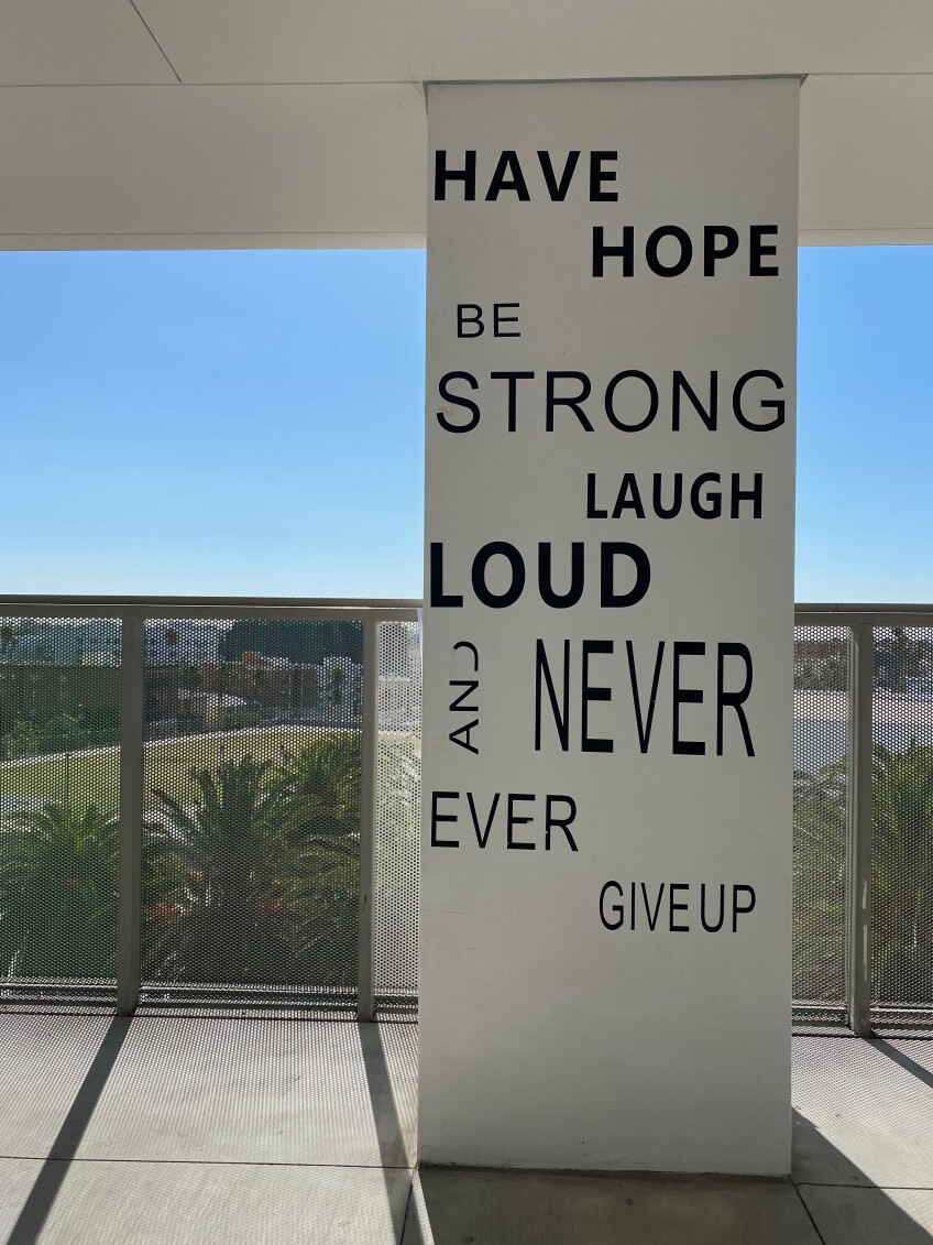 Messages of positivity are painted on pillars in the halls of Los Angeles High School for the Arts.